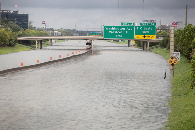 Water flows down Interstate 10 which has been inundated with flooding from Hurricane Harvey on August 27, 2017 in Houston, Texas. (Photo by Scott Olson/Getty Images)